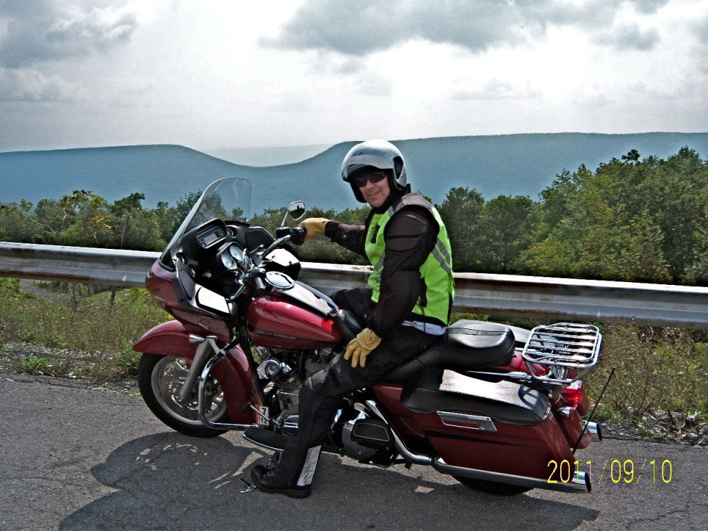 The author on his Harley-Davidson Road Glide motorcycle at the scenic turnout with Saddle Mountain in the background. Photo by a fellow traveler who was enjoying the scenery and offered to take my picture.