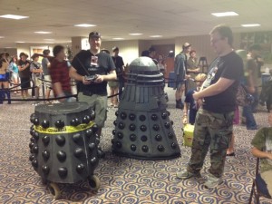 Doctor Who fans display life sized working Die-lecks for the passing crowd.