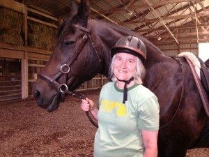Marilee poses with Balboa, her trusty stead at the Cat Hollow Farm in New York.