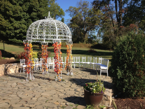 The gazebo where the vows were to be exchanged. Rain inhibited this ourtdoor event but was carried on inside without impact to spirits.