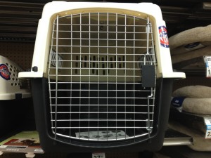 Squeeze latched door with top holes for zip-tie secured closing in transport mode.