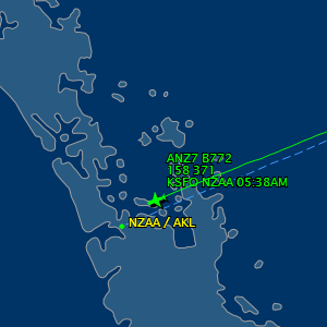 In photo. On a map, the tiny outline of an airplane is on the flight path to Aukland, New Zealand. End photo.