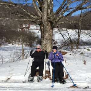 In photo Esther and Linda take advantage of two chairs found abandoned at the bottom of the mountain. A welcome rest after their trek.
