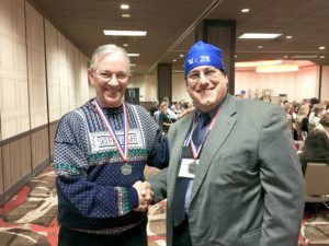 In photo. Ed and Larry share a celebratory handshake at Larry's first place rally win in his category. Out of photo.