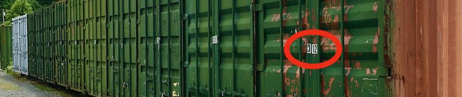 Photo shows a slice of the line of containers. The NEPA container is nearest the viewer with C12 circled in red.